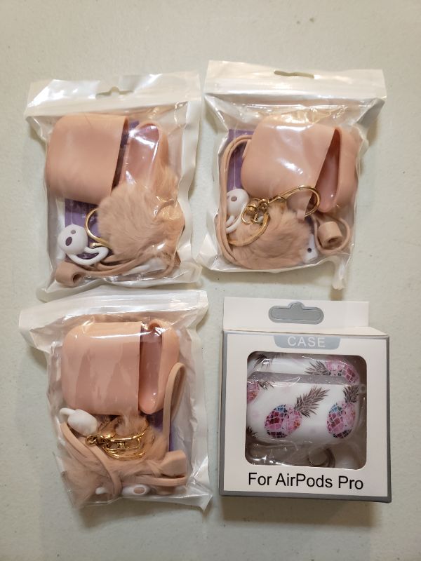 Photo 1 of Air Pods cases, lot of 4.