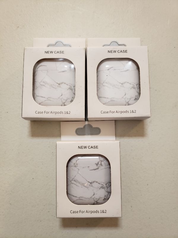 Photo 1 of Air Pods Carrying Cases, Lot of 3.