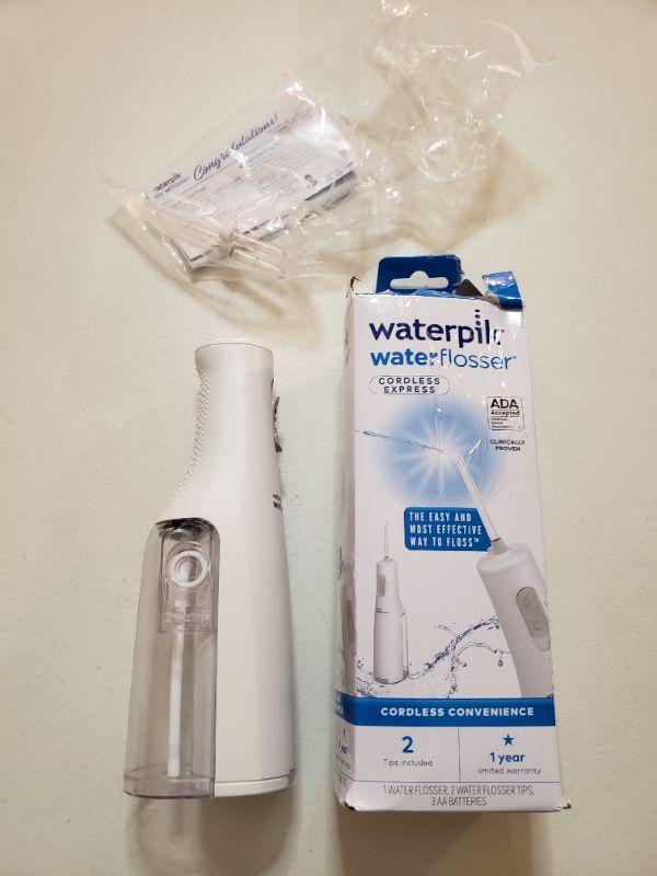 Photo 2 of Cordless Express Water Flosser, White WF-02. Box Damage