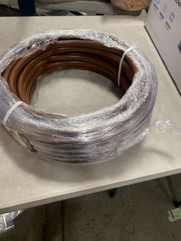 Photo 1 of 1/2 in. (0.600 in. I.D. x 0.700 in. O.D.) x 100 ft. Brown Drip Irrigation Poly Tubing
