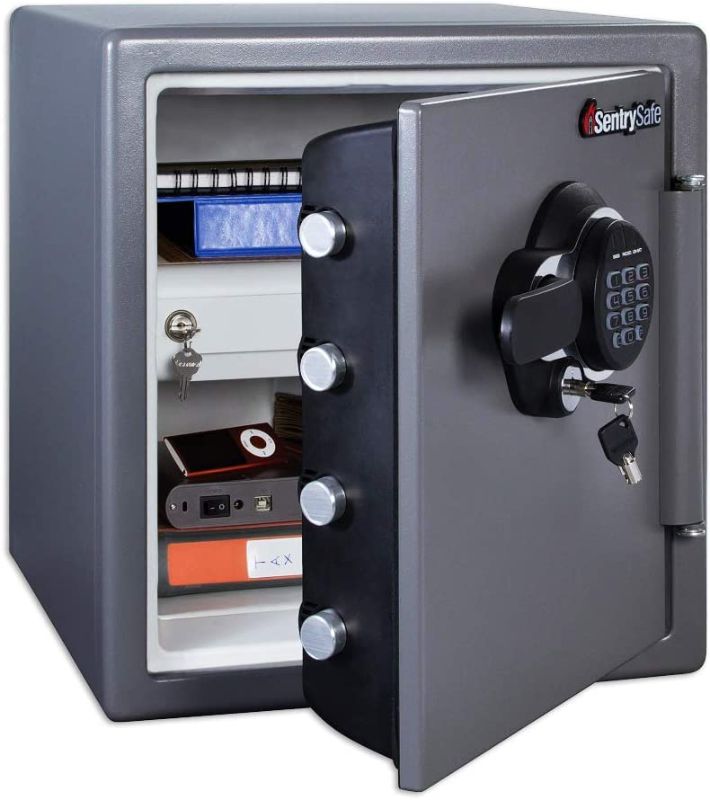 Photo 1 of *SEE last pictures for damage*
*MISSING manual and keys* 
SentrySafe SFW123GDC Fireproof Waterproof Safe with Digital Keypad, 1.23 Cubic Feet, Gun Metal Gray, 19.3 x 16.3 x 17.8 inches

