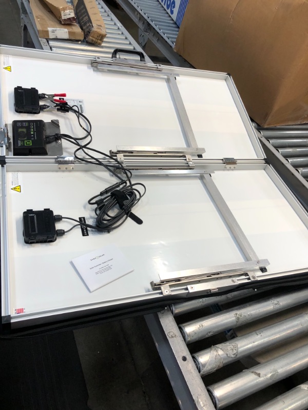 Photo 1 of *SEE last picture for damage*
Zamp solar Legacy Series 230-Watt Portable Solar Panel Kit with Integrated Charge Controller and Carrying Case. Off-Grid Solar Power for RV Battery Charging - USP1004
