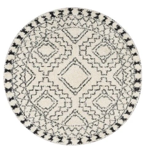 Photo 1 of *SEE last picture for damage*
nuLOOM Vasiliki Moroccan Tassel Shag Off-White 4 ft. Round Rug