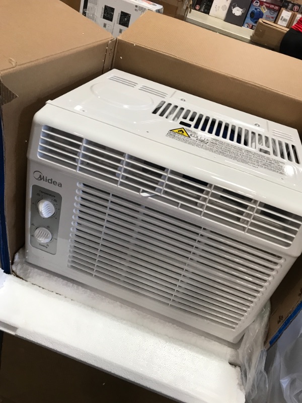 Photo 2 of MIDEA MAW05M1BWT Window air conditioner 5000 BTU with Mechanical Controls, 7 temperature settings, 2 cooling and fan settings, 110V, White