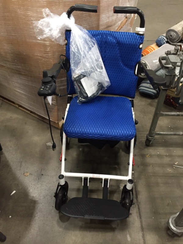 Photo 2 of 
Folding Electric Powered Wheelchair Lightweight Portable Smart Chair Personal Mobility Scooter Wheelchair - Weighs only 40 lbs with Battery(Blue)

//does not hold a charge 