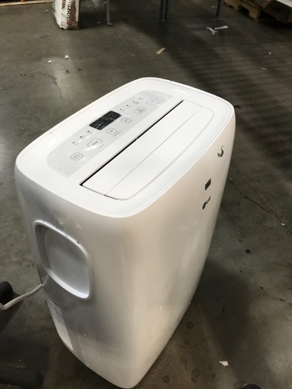 Photo 7 of 6,000 BTU (DOE) 115-Volt Portable Air Conditioner with Dehumidifier Function and LCD Remote in White