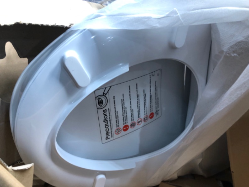 Photo 1 of Alpha iX Hybrid Bidet Toilet Seat in Elongated White | Endless Warm Water | Stainless Steel Nozzle | 4 Wash Functions | LED Nightlight | Warm Air Dryer | Wireless Remote | Oscillation and Pulse
