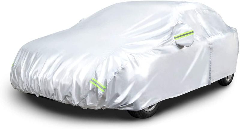 Photo 1 of **CAR COMPATABILITY UNKNOWN**
Amazon Basics Silver Weatherproof Car Cover 
