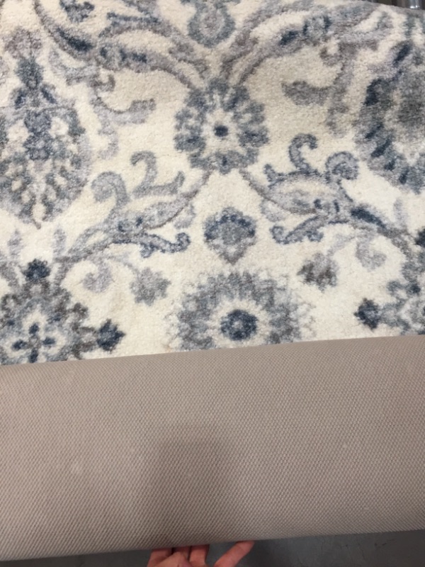 Photo 1 of **GENERAL POST**BOTH RUGS HAVE STAINS**

2 PIECE RUGS 9'10"X2'6" RUNNER BLUE/BEIGE , 2'X3" RECATANGLE BATH RUG