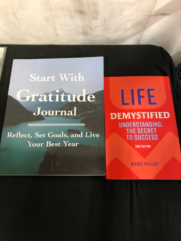 Photo 3 of 2PC LOT
Start with Gratitude Journal: Reflect, Set Goals, and Live Your Best Year Paperback 

Life Demystified: Understanding: the Secret to Success Paperback
