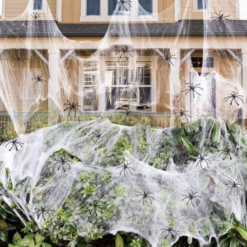 Photo 1 of 900 sqft Spider Webs Halloween Decorations Bonus with 30 Fake Spiders, Super Stretch Cobwebs for Halloween Indoor and Outdoor Party Supplies
2 COUNT 