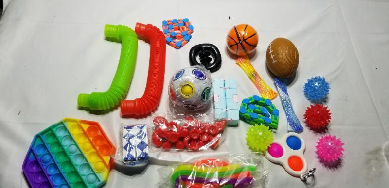 Photo 1 of Pop Fidget Toys Pack Mini pop Autism Special Needs Stress Relief Silicone Pressure Relieving Toys Fidget Sensory Stress Ball Anxiety Relief Toys for Kids Adults Pop Pack Toys