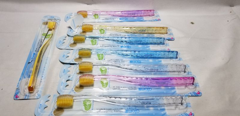 Photo 1 of ATOMI TOOTHBRUSH, 8 PK (ONE PC OPENED) 