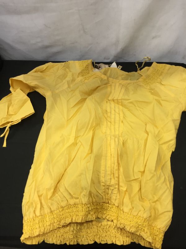 Photo 1 of YELLOW TOP FOR WOMENS SIZE MEDIUM 