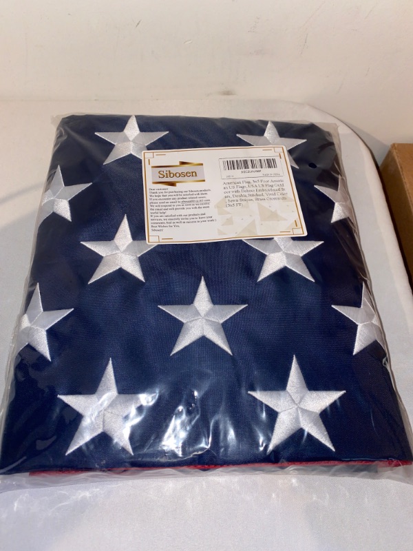 Photo 2 of American Flag 3x5 Feet,Outdoor Us Heavy Duty Nylon Tough Durable USA Flags,Embroidered Stars,Sewn Stripes,Brass Grommets (3 by 5 foot)