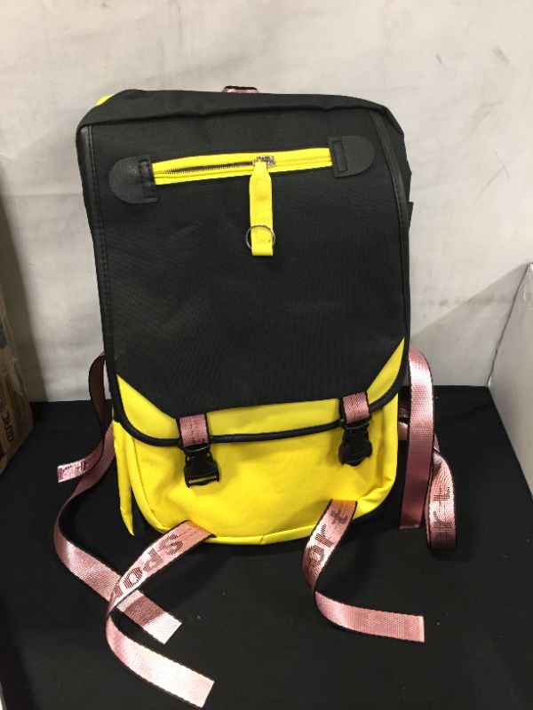 Photo 1 of YELLOW BLACK AND PINK BACKPACK 