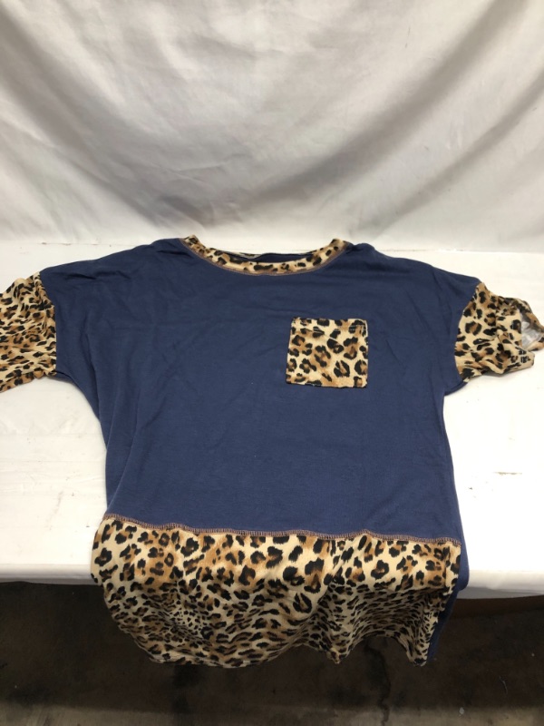 Photo 1 of WOMENS BLUE AND CHEETAH PRINT TSHIRT SIZE SMALL