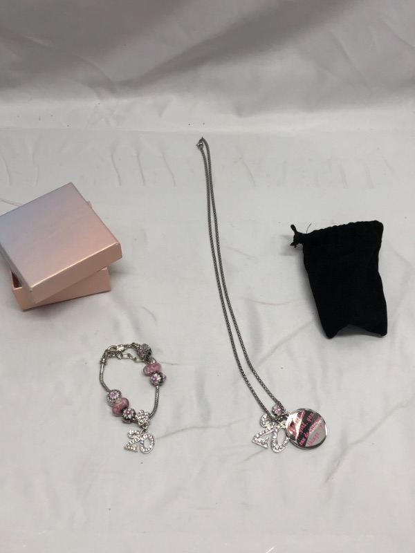 Photo 1 of 20TH BIRTHDAY CHERRY BLOSSUM CHARM BRACLET AND NECKLACE 