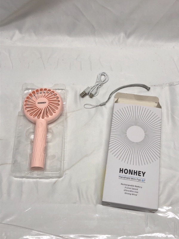 Photo 1 of PINK USB CHARGING HAND HELD FAN 