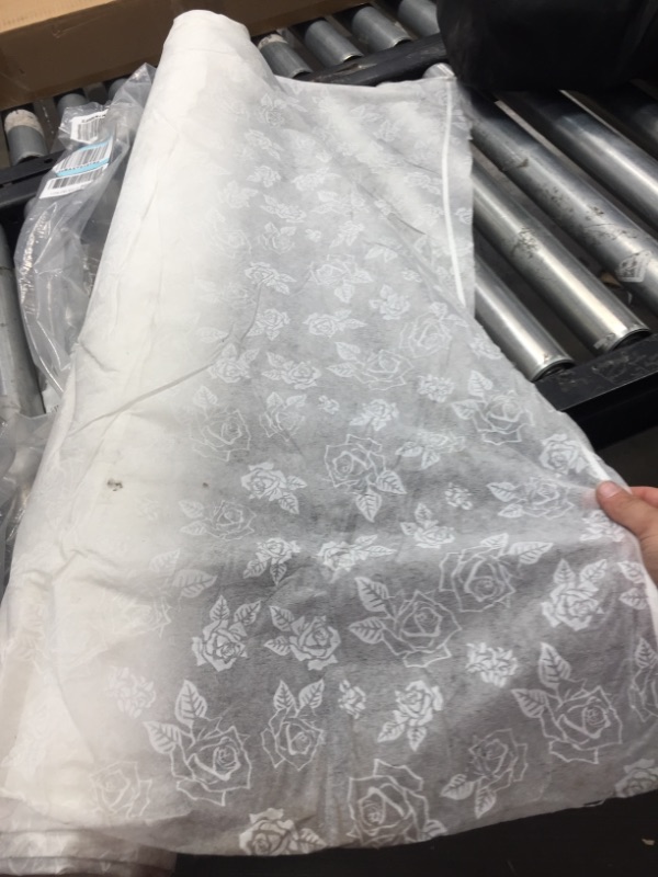 Photo 1 of 50 ft of white floral cloth 