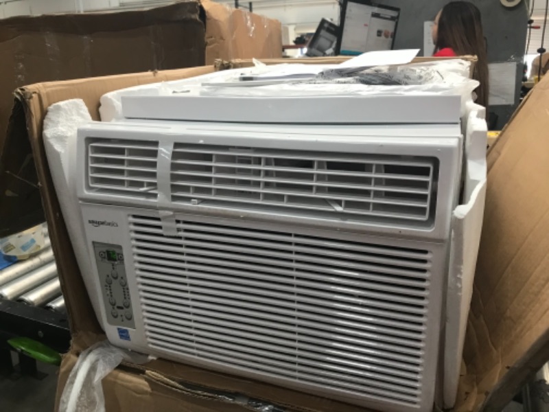 Photo 2 of Amazon Basics Window-Mounted Air Conditioner with Remote - Cools 550 Square Feet, 12000 BTU, Energy Star
