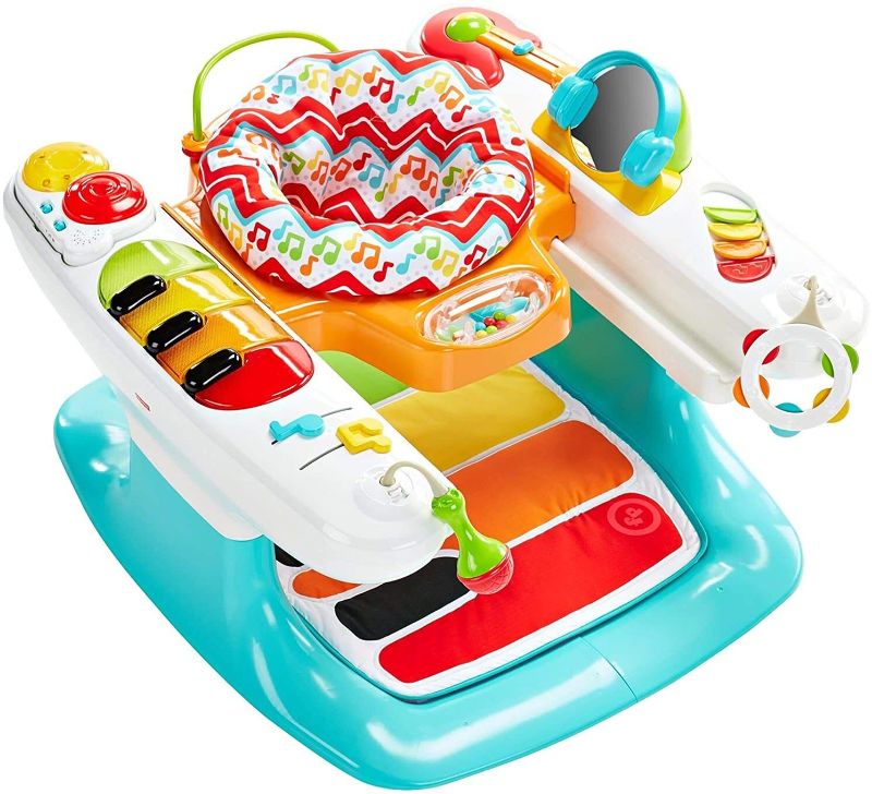 Photo 1 of Fisher-Price 4-in-1 Step 'n Play Piano
