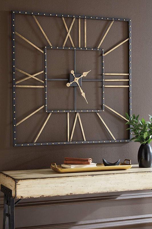 Photo 1 of Ashley Furniture Signature Design - Thames Wall Clock - Contemporary Glam - Black/Gold Finish