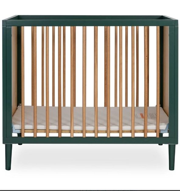 Photo 1 of Dream On Me Lucas 4-In-1 Mini Modern Crib With Rounded Spindles I Convertible Crib I Mid- Century Meets Modern I Portable Crib - Dream On Me 632-OLV
