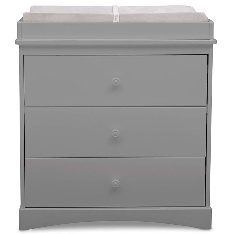 Photo 1 of Delta Children Sutton 3 Drawer Dresser with Changing Top, Grey...**MISSING SOME HARDWARE**, **DAMAGED**,  **MISSING MANUAL**

