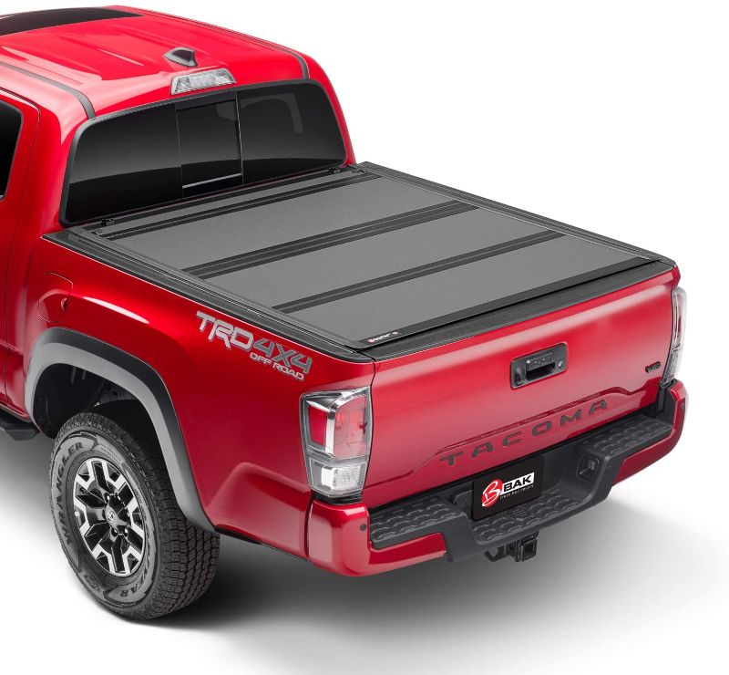 Photo 1 of BAK BAKFlip MX4 Hard Folding Truck Bed Tonneau Cover | 448426 | Fits 2016 - 2021 Toyota Tacoma w/ OE track system 5' 1" Bed (60.5")
