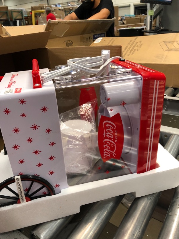 Photo 1 of Nostalgia SCM550COKE Coca-Cola Countertop Snow Cone Maker Makes 20 Icy Treats, Includes 2 Reusable Plastic Cups & Ice Scoop – White/Red
