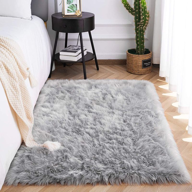 Photo 1 of 72 x 46" grey faux fur rug