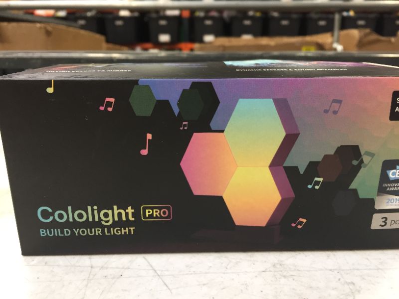 Photo 3 of Cololight Hexagon Lights, Wall Light for Room Decor, Night Light, Music Sync LED Gaming Light, App Control Cool RGB Lights for Bedroom Decoration  (BOX OPENED FOR PICTURES)