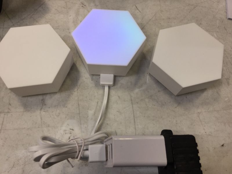 Photo 4 of Cololight Hexagon Lights, Wall Light for Room Decor, Night Light, Music Sync LED Gaming Light, App Control Cool RGB Lights for Bedroom Decoration  (BOX OPENED FOR PICTURES)