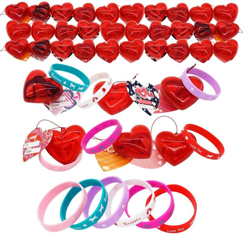 Photo 1 of Kissdream 28 Pcs Kids Valentines Party Favors Set include 30 Silicon Rubber Bands Wristbands Filled Hearts and 30 Valentines Day Cards for Classroom Exchange Party Favor
