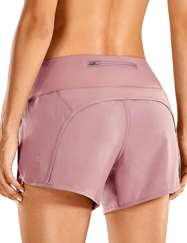 Photo 1 of CRZ YOGA Women's Quick-Dry Athletic Sports Running Workout Shorts with Zip Pocket - 4 Inches, SIZE S