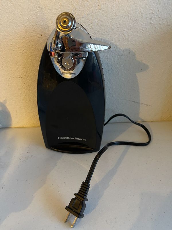 Photo 1 of Hamilton Beach Electric Automatic Can Opener with Auto Shutoff, Knife Sharpener, Cord Storage, and SureCut Patented Technology, Extra Tall, Black