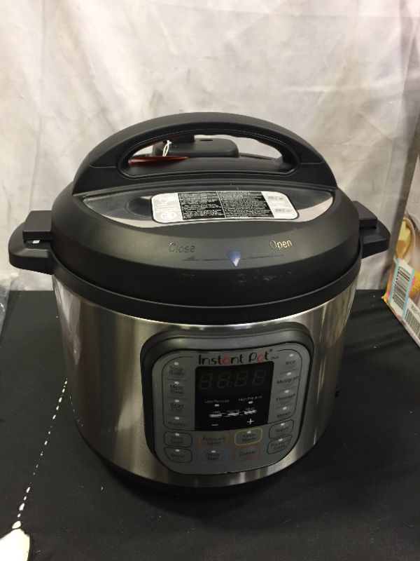 Photo 1 of Instant Pot DUO60 6-Quart 7-in-1 Multi-Use Programmable Pressure Cooker