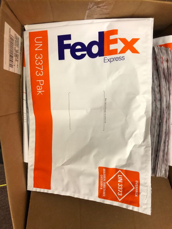 Photo 2 of Box of UPS and FedEx Shipping Bags