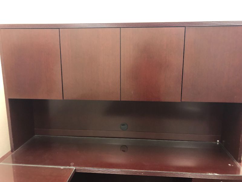 Photo 2 of Large Dark Cherry Colored U Shaped Desk With Glass Top and Storage Hutch and Black Office Chair Black and Silver Floor Mat Included