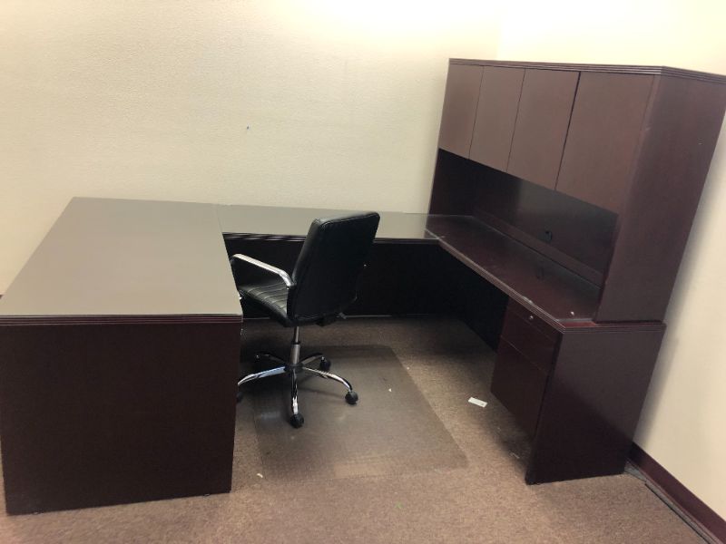 Photo 1 of Large Dark Cherry Colored U Shaped Desk With Glass Top and Storage Hutch and Black Office Chair Black and Silver Floor Mat Included