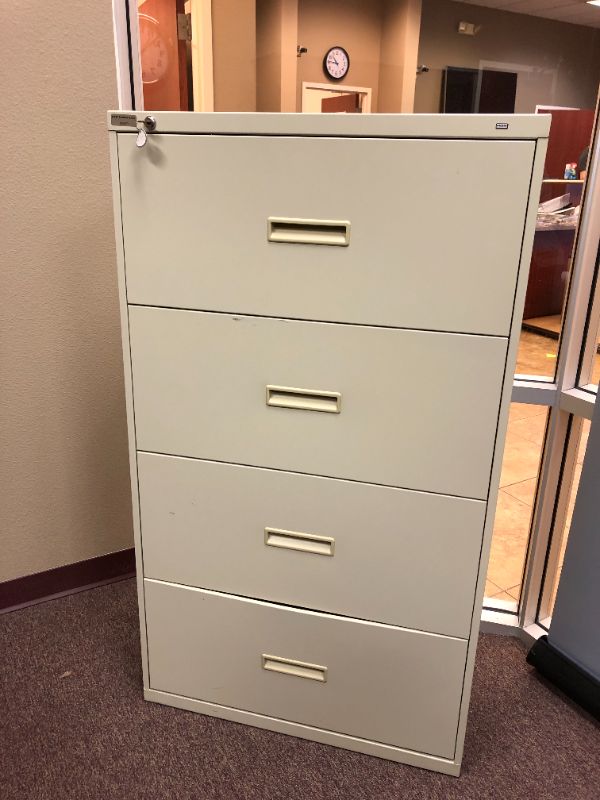 Photo 1 of 3 drawer tall filing cabinet sold as is 