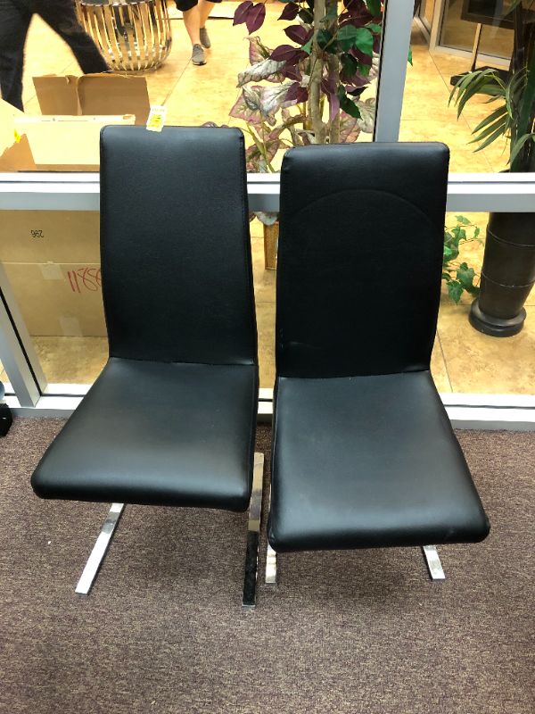 Photo 1 of 2 faux leather chairs black sold as is 