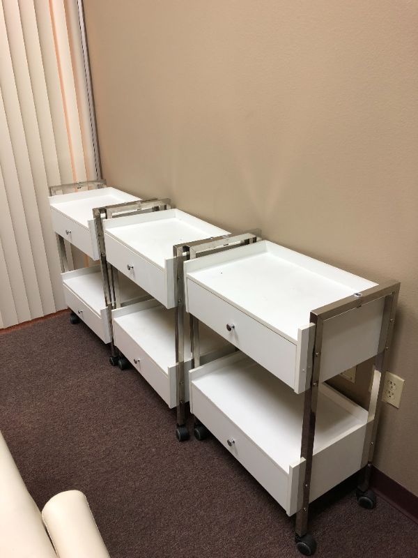 Photo 1 of set of 3 white 2 drawer wooden rolling storage carts used sold as is 