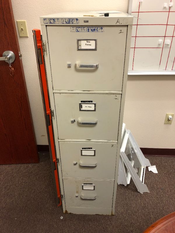 Photo 1 of 4 drawer filing cabinet 