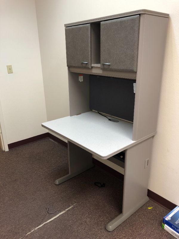 Photo 1 of medical desk with small cabinets grey single item sold as is 