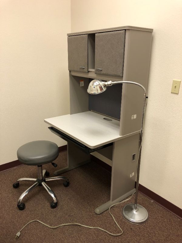 Photo 1 of medical desk, rolling stool and lamp set sold together as is 3 items 