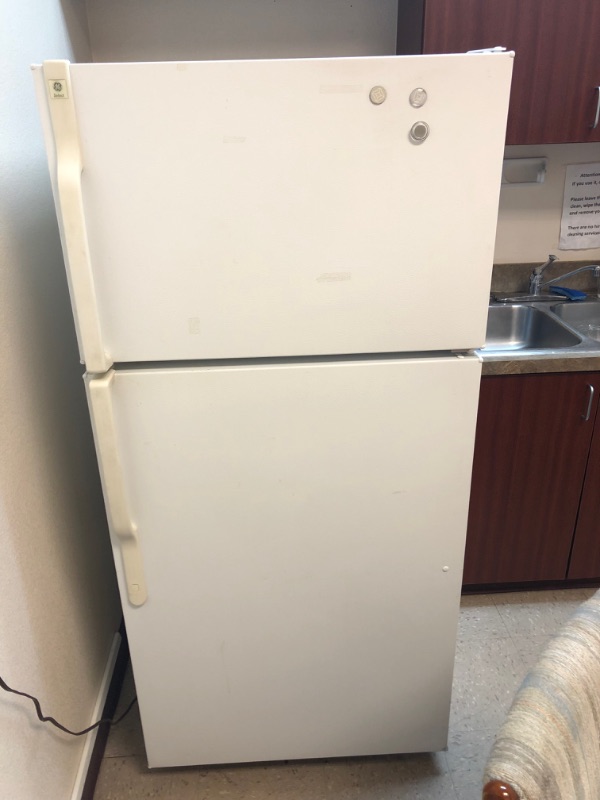 Photo 1 of White fridge. 58 inches tall