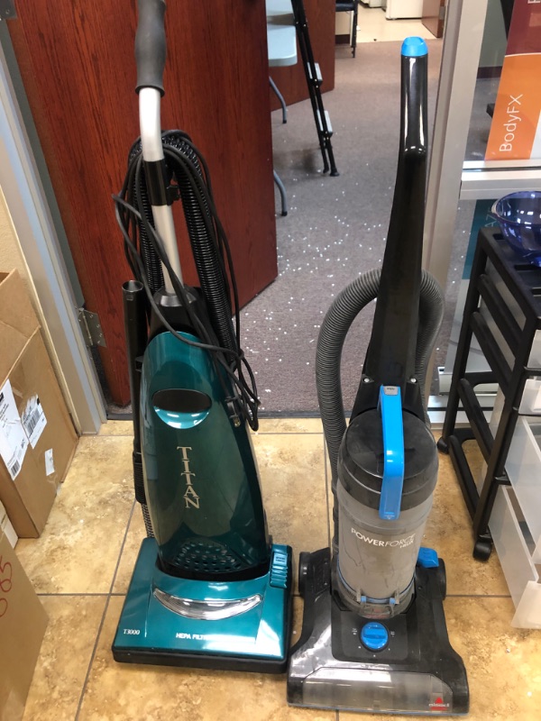 Photo 1 of 2 Vacuum Cleaners. 