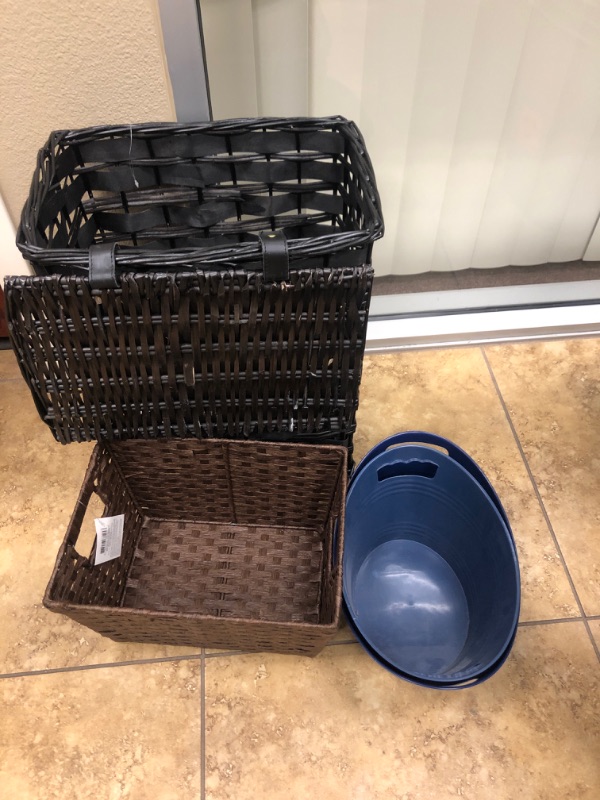 Photo 1 of Miscellaneous lot of 2 Wicker baskets and 2 plastic bins. 4 items